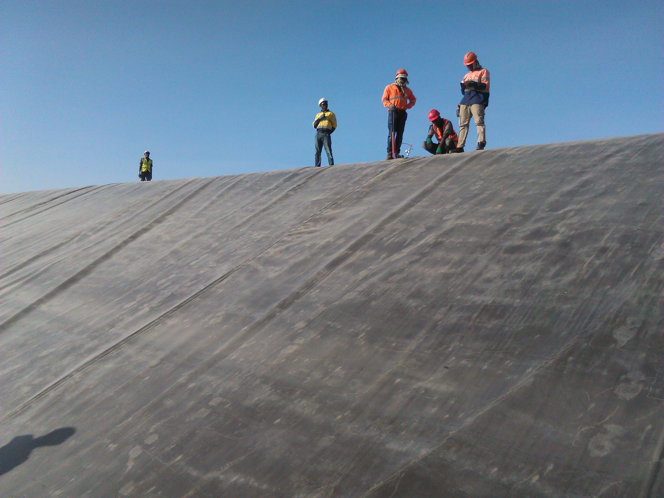 Industrial construction workers on site